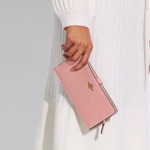 Coach “Skinny Wallet” pinkish tan